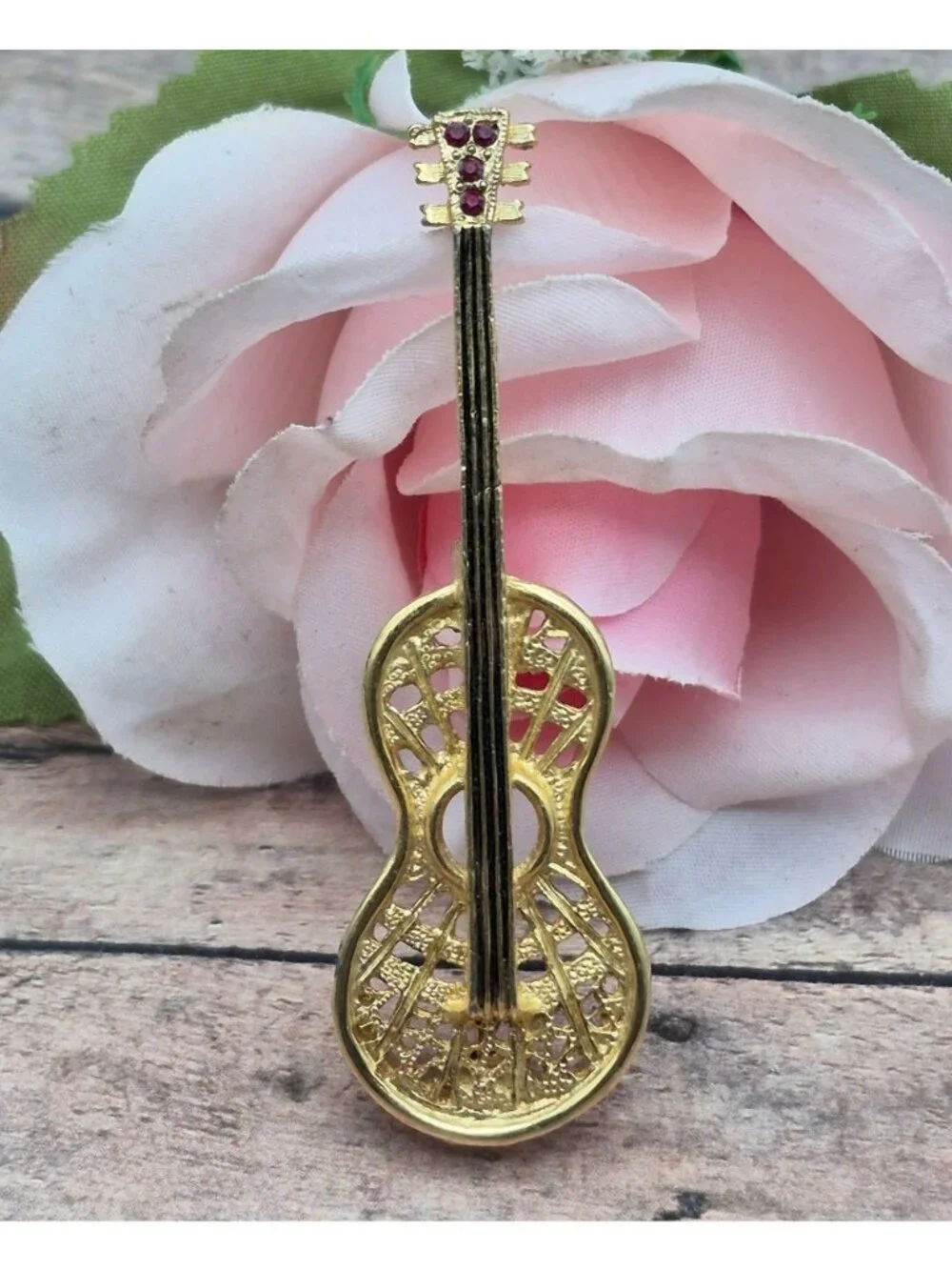 Vintage Gold-Tone Guitar Brooch With Red Rhinestones Intricate Filigree Design